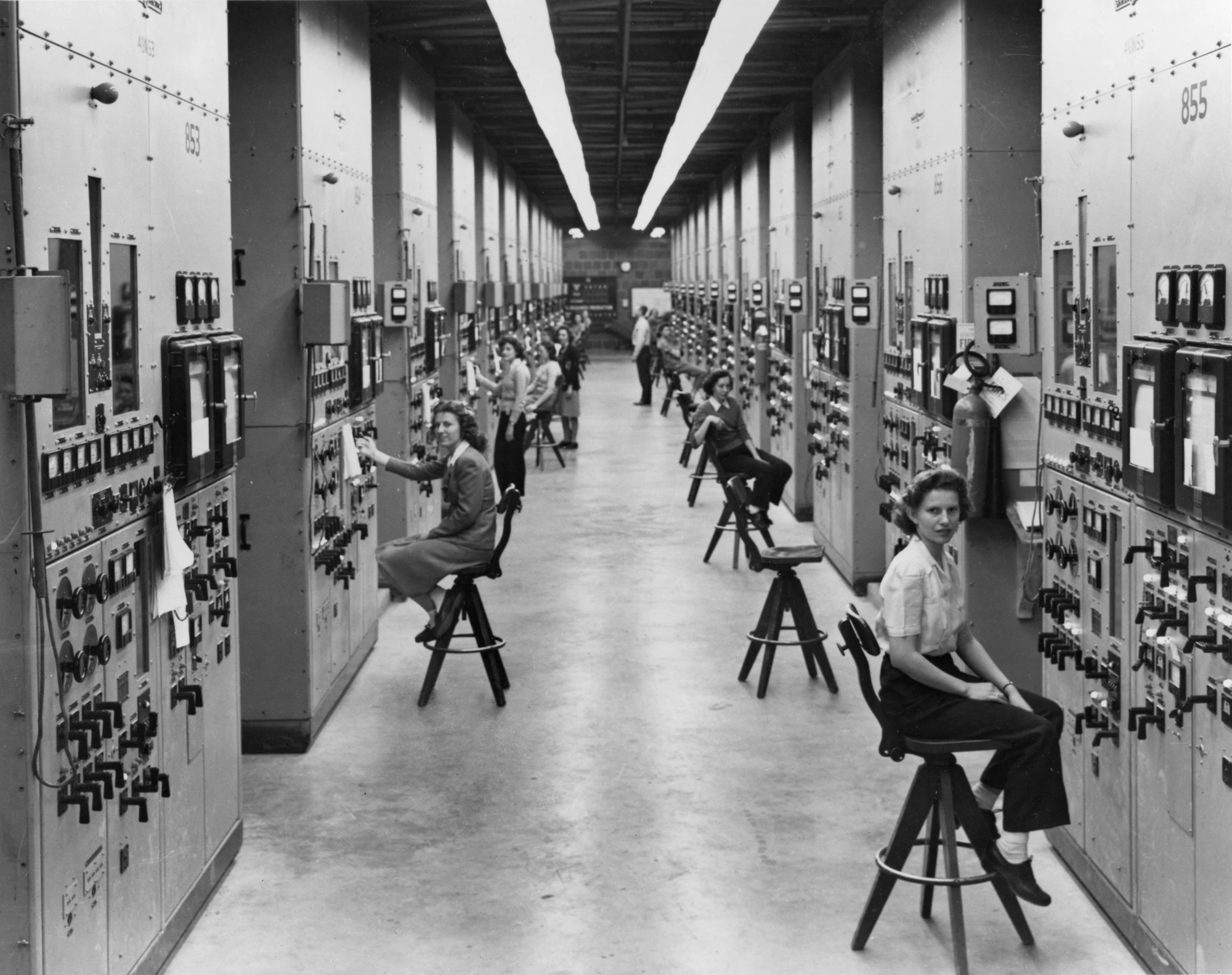 Calutron operators working at control panels in the Y-12 plant in 1944.